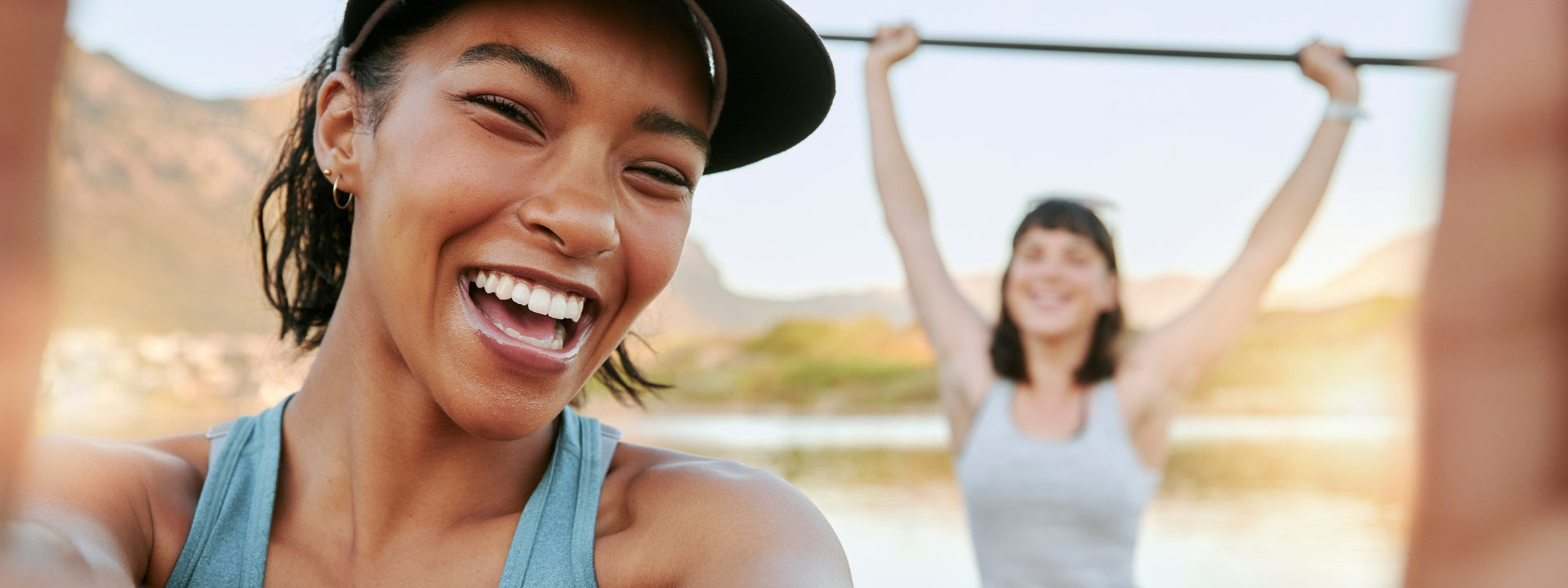 Two women working out take a selfie